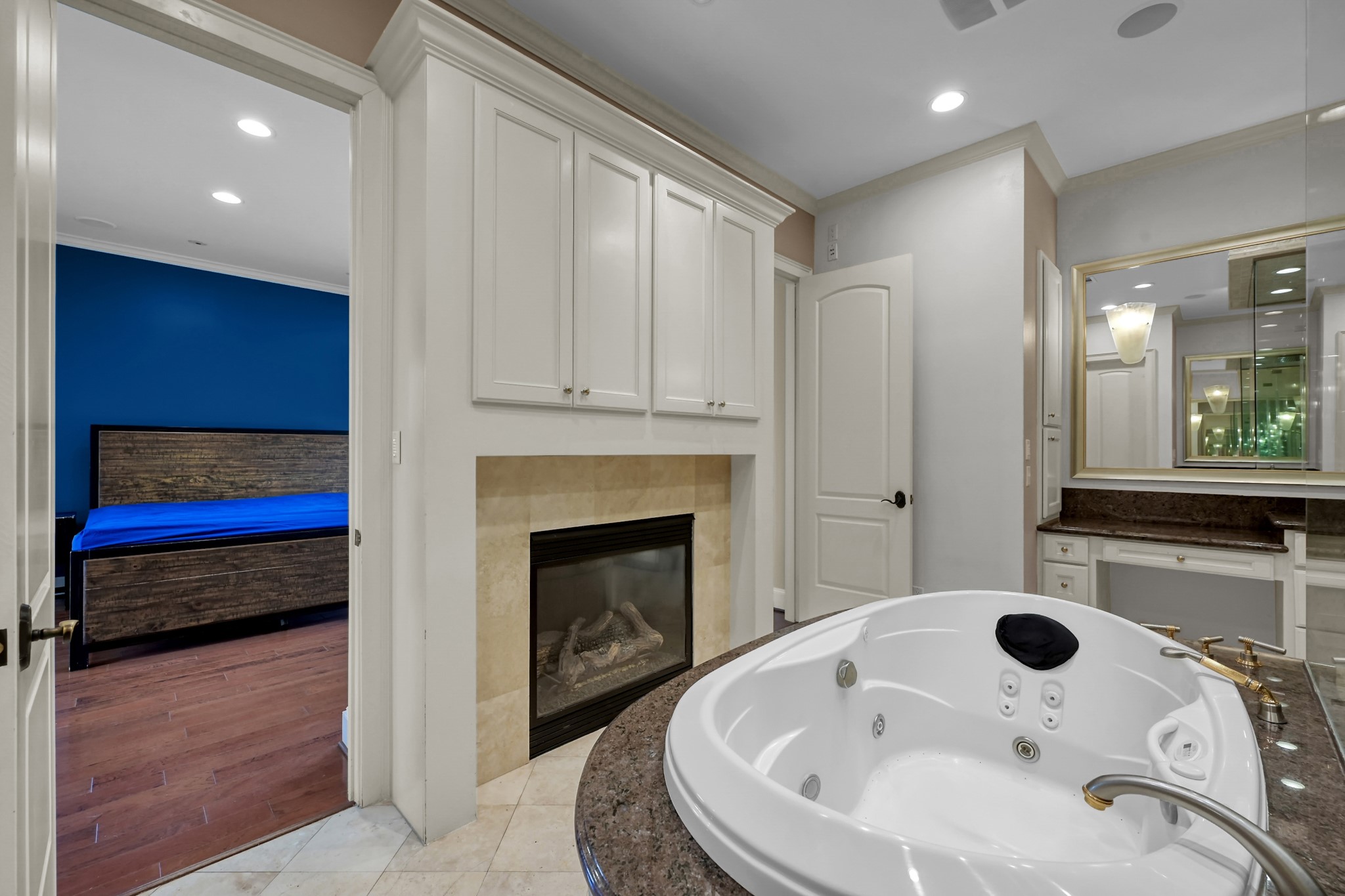 9602 Chatfield Street Houston, TX 77025 - Photo 25 of 48 a bathroom with a sink and a mirror