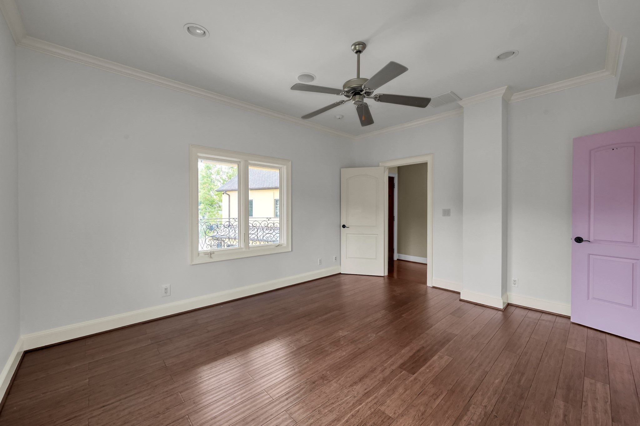 9602 Chatfield Street Houston, TX 77025 - Photo 30 of 48 a view of an empty room with wooden floor and a window