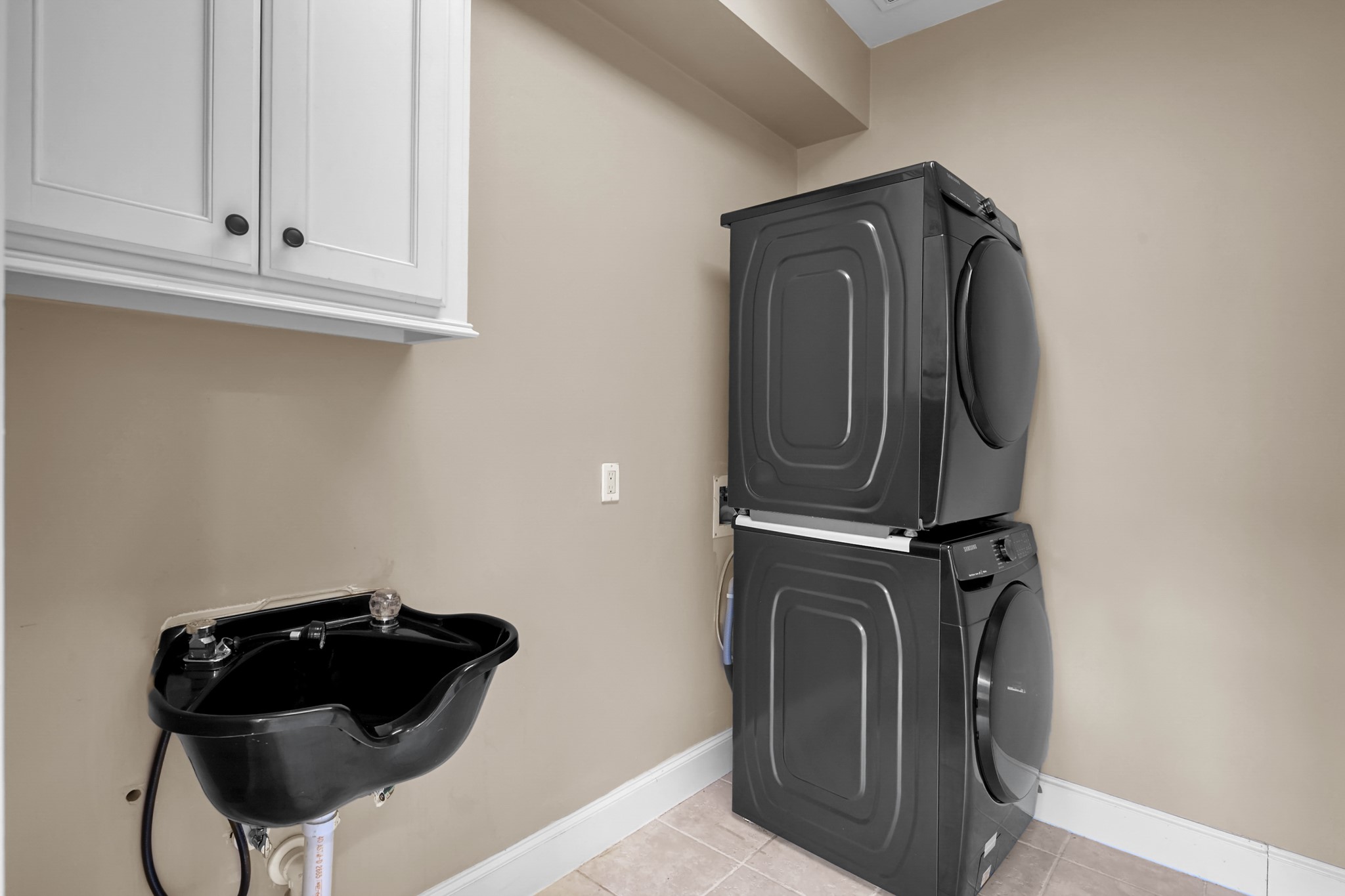 9602 Chatfield Street Houston, TX 77025 - Photo 34 of 48 a view of a storage and utility room in a utility room