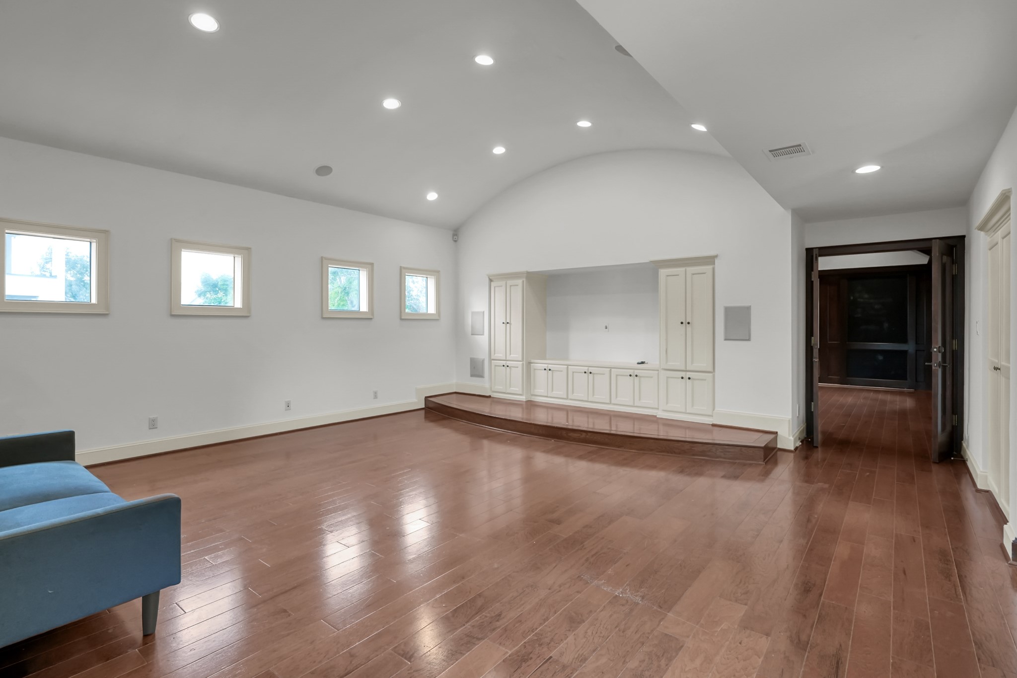 9602 Chatfield Street Houston, TX 77025 - Photo 38 of 48 an empty room with wooden floor and windows