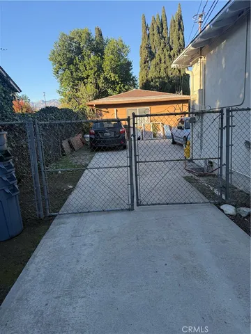 a view of a street with sitting area