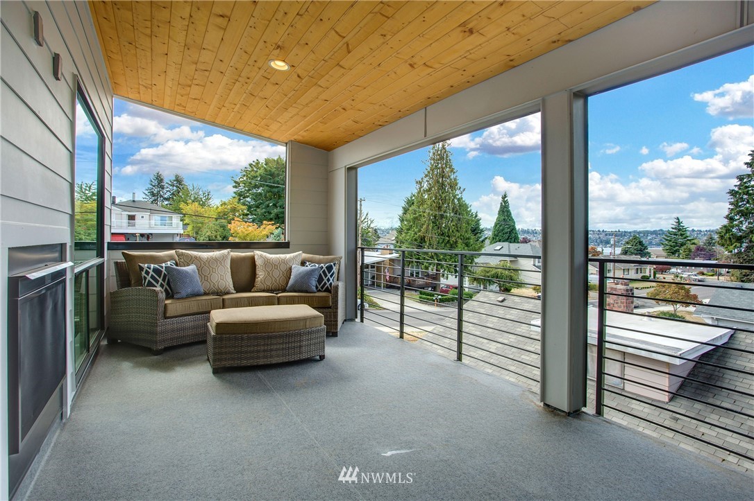 1002 North 30th Street Renton, WA 98056 - Photo 4 of 25 a view of a living room and balcony