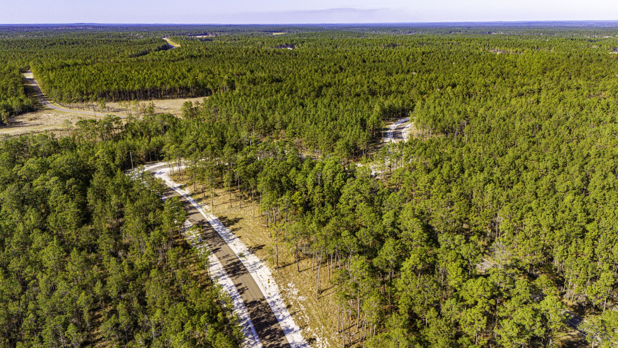 313 King Ranch Road Onalaska, TX 77360 - Photo 12 of 24 a view of an ocean from a beach