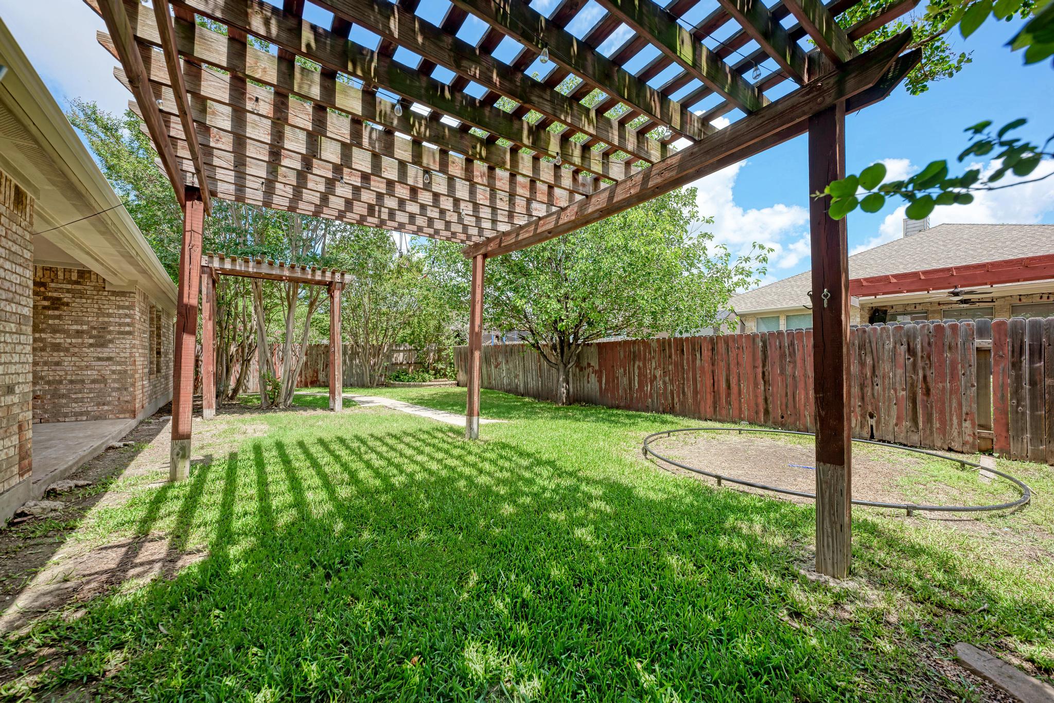18308 Shallow Pool Drive Pflugerville, TX 78660 - Photo 31 of 40 Two pergolas for extra entertaining and/or relaxation spaces!
