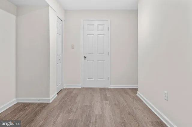 a bathroom with a sink toilet and mirror