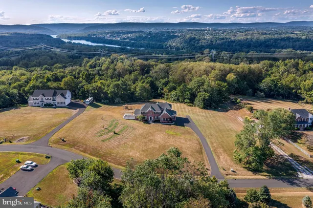 a view of a city with a lake