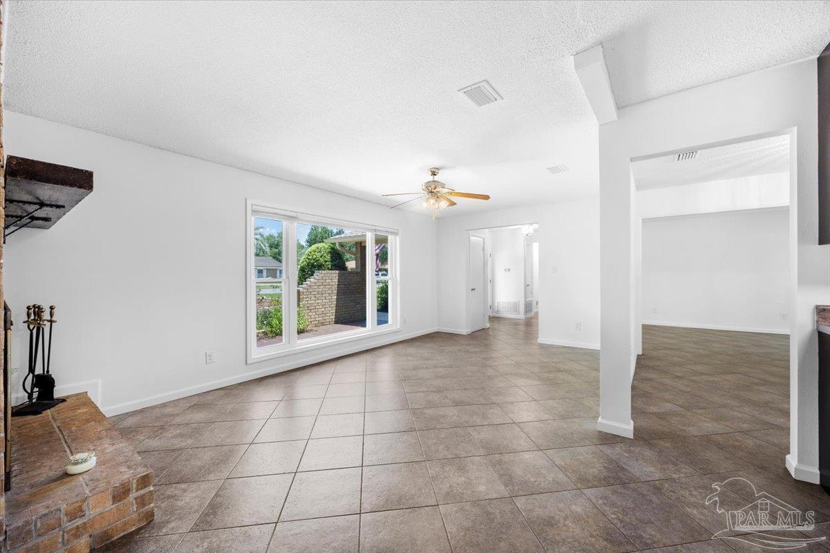 115 Bear Drive Gulf Breeze, FL 32561 - Photo 13 of 40 a view of an empty room with a window