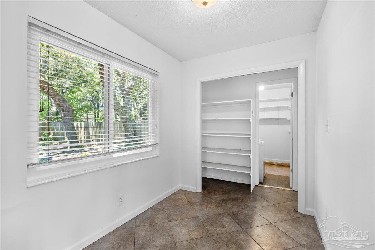 115 Bear Drive Gulf Breeze, FL 32561 - Photo 18 of 40 a view of an empty room with a window