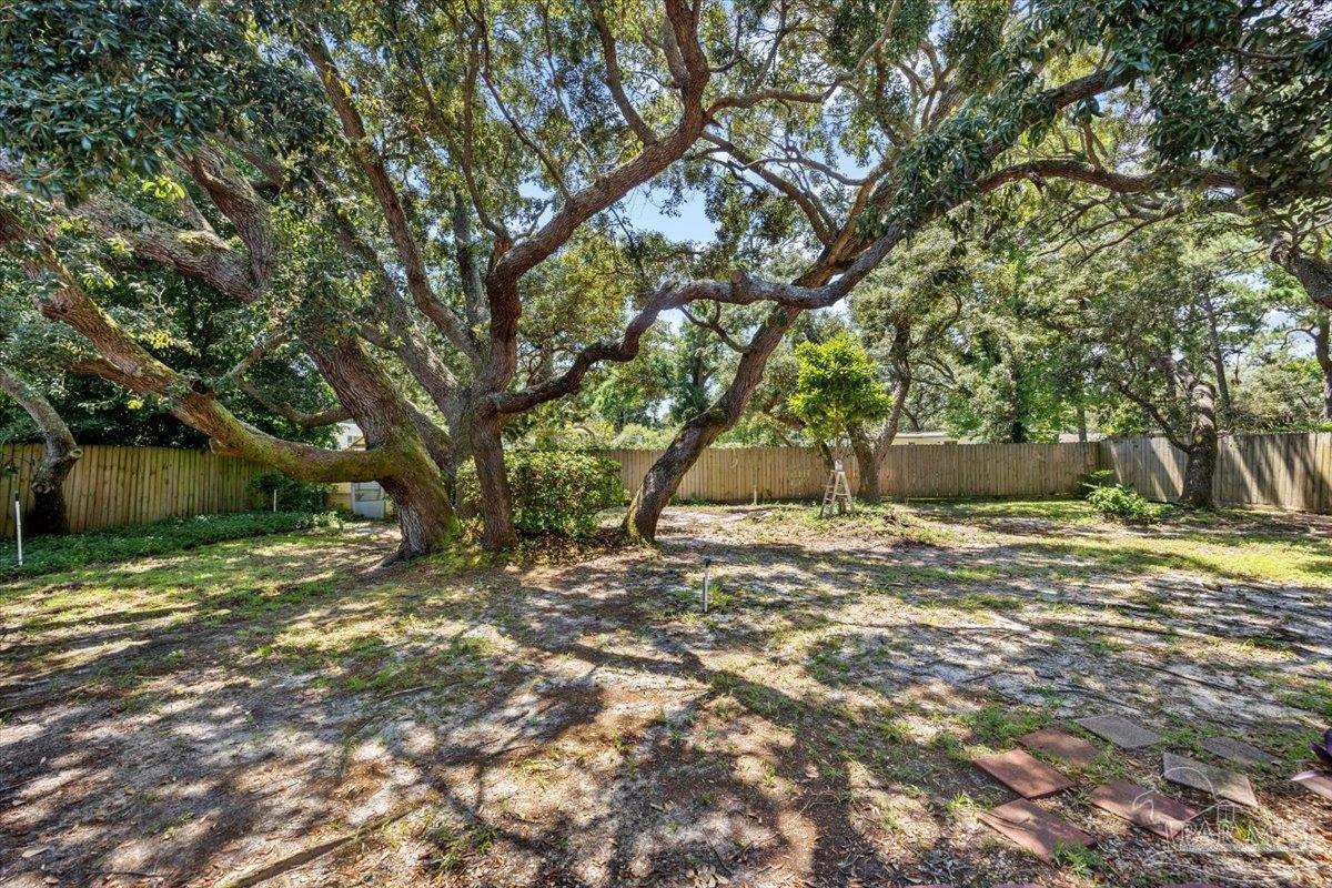 115 Bear Drive Gulf Breeze, FL 32561 - Photo 30 of 40 a fire hydrant in the middle of a field