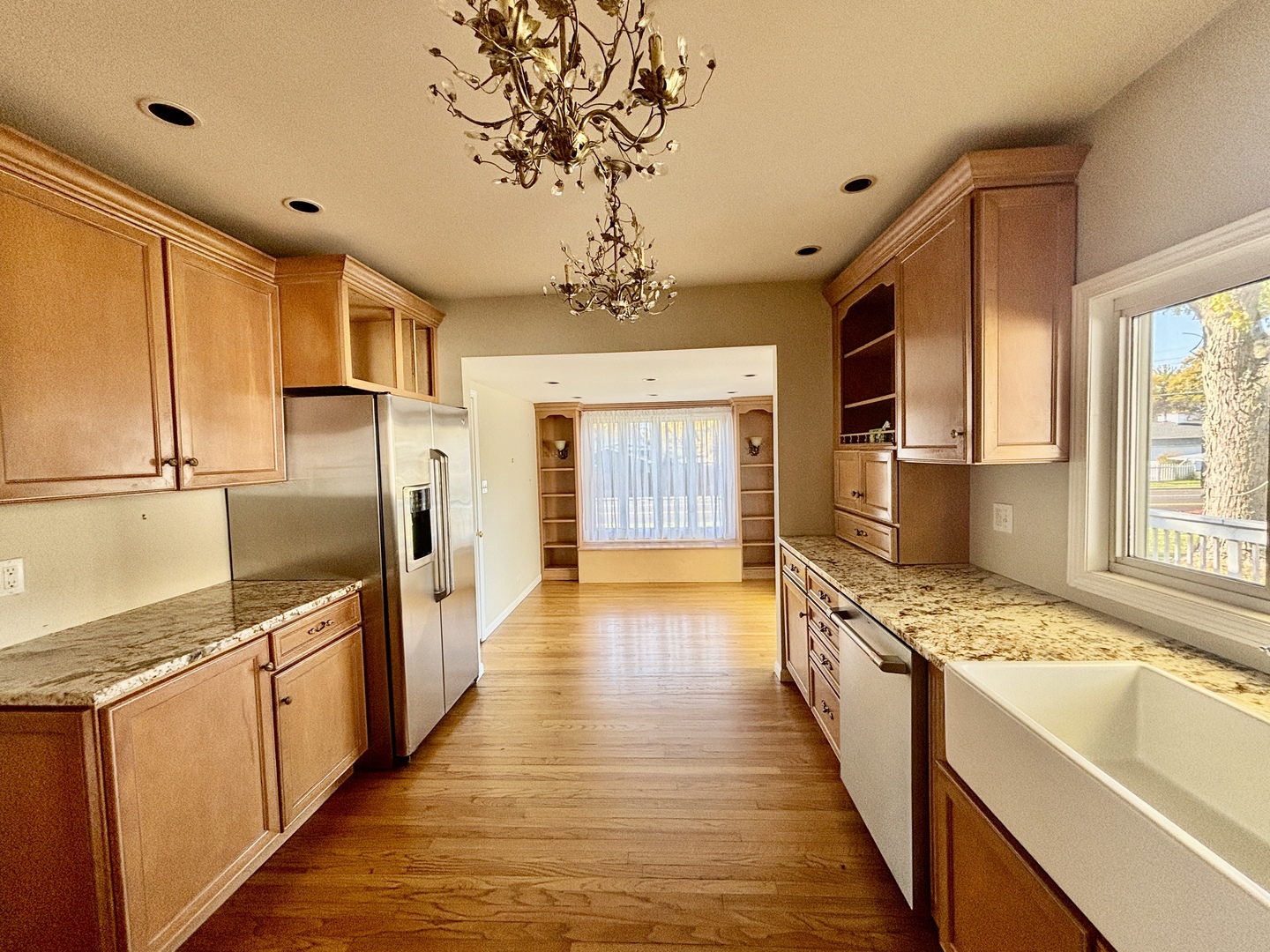 758 Maple Avenue Lisle, IL 60532 - Photo 9 of 31 a large kitchen with stainless steel appliances granite countertop a lot of counter space and wooden floor