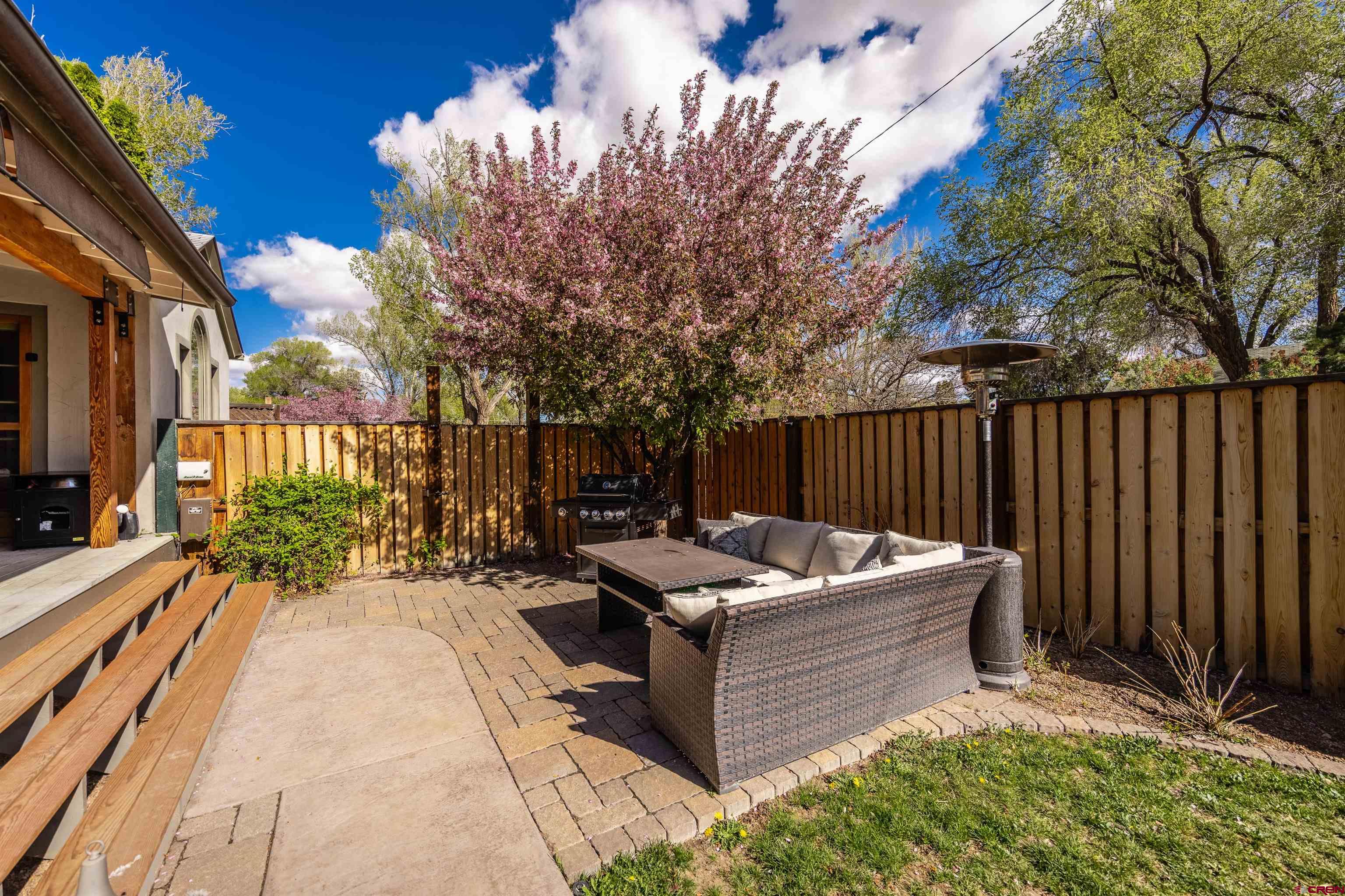 1146 South 2nd Street Montrose, CO 81401 - Photo 33 of 41 a view of a chairs and table in the patio