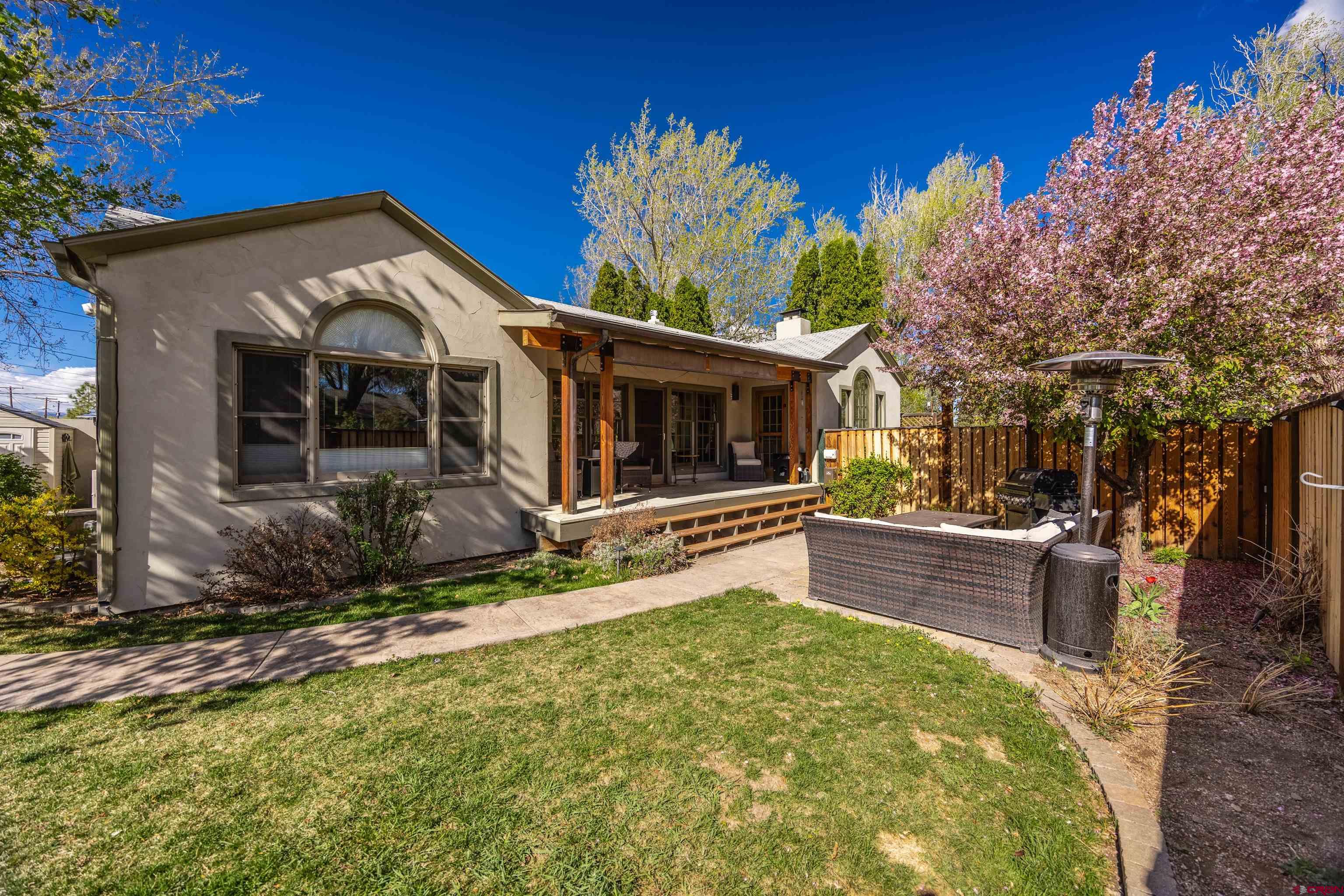 1146 South 2nd Street Montrose, CO 81401 - Photo 34 of 41 a view of a house with backyard and sitting area