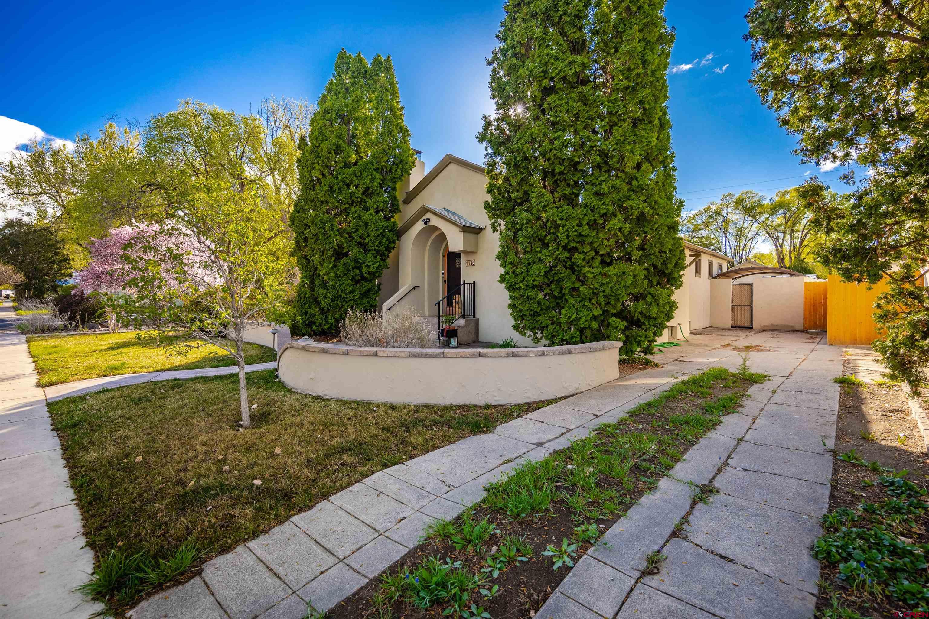 1146 South 2nd Street Montrose, CO 81401 - Photo 7 of 41 a view of a garden with plants