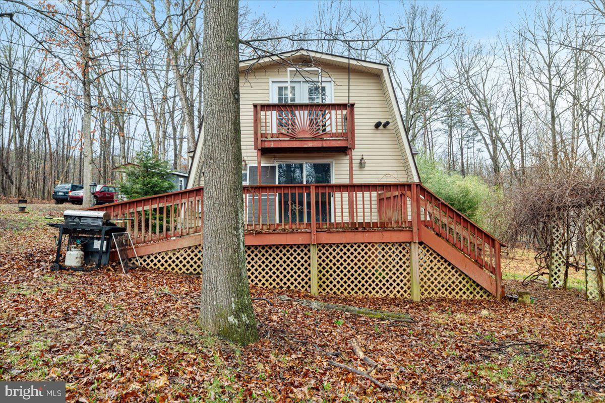 297 Deer Run Road Gore, VA 22637 - Photo 2 of 23 Charming home nestled in nature's embrace.