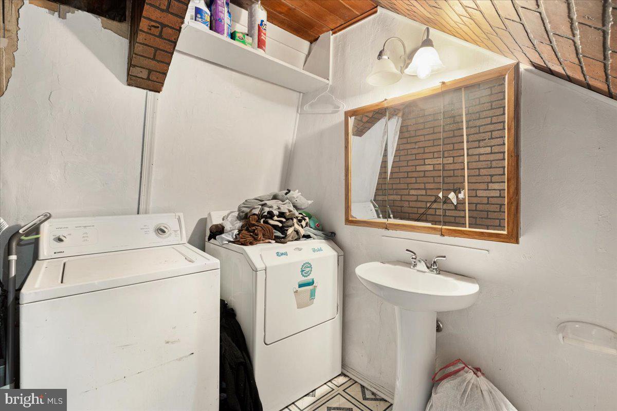 297 Deer Run Road Gore, VA 22637 - Photo 10 of 23 Charming laundry nook with rustic flair.