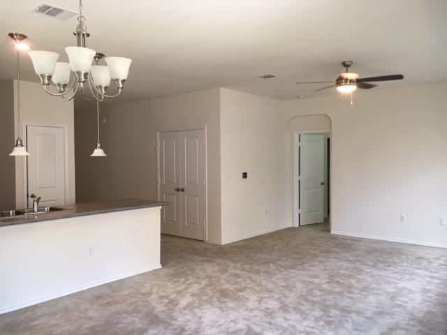 7700 Crystalbrook West Austin, TX 78724 - Photo 5 of 11 a view of a chandelier fan and entryway