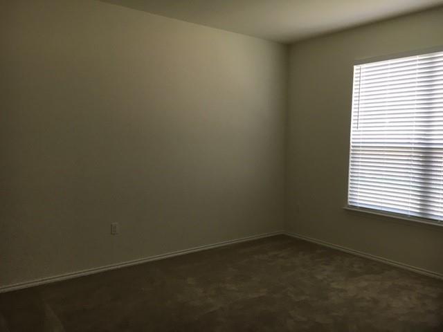 7700 Crystalbrook West Austin, TX 78724 - Photo 7 of 11 an empty room with a window