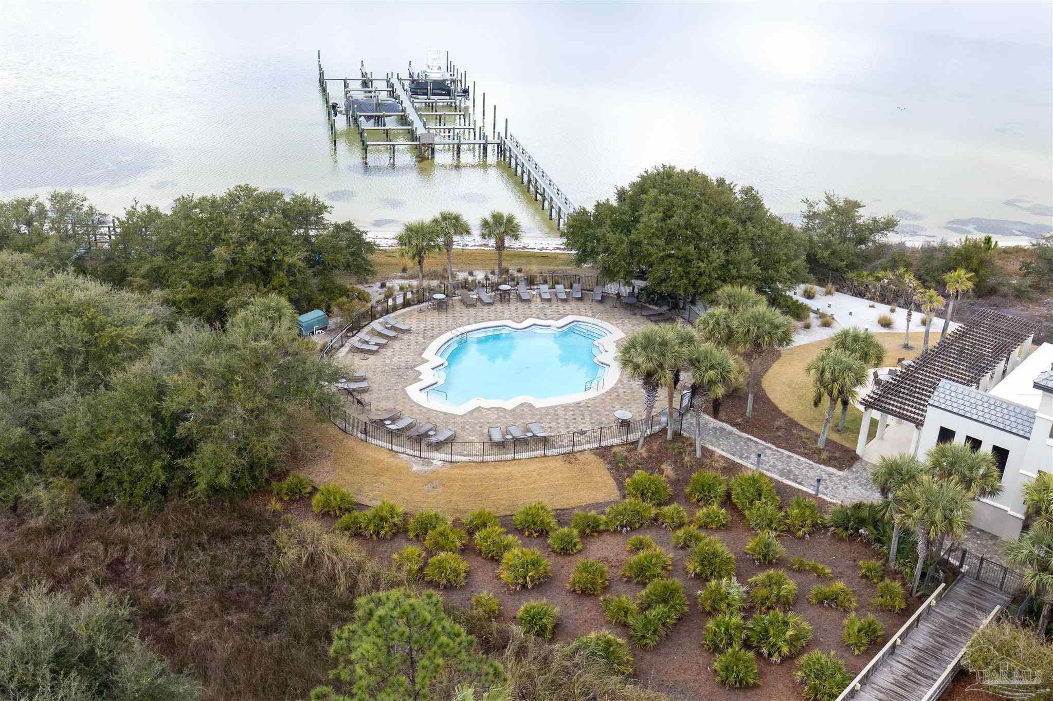 14900 River Road, Unit 904 Perdido Key, FL 32507 - Photo 50 of 62 an aerial view of a house with a yard and lake view