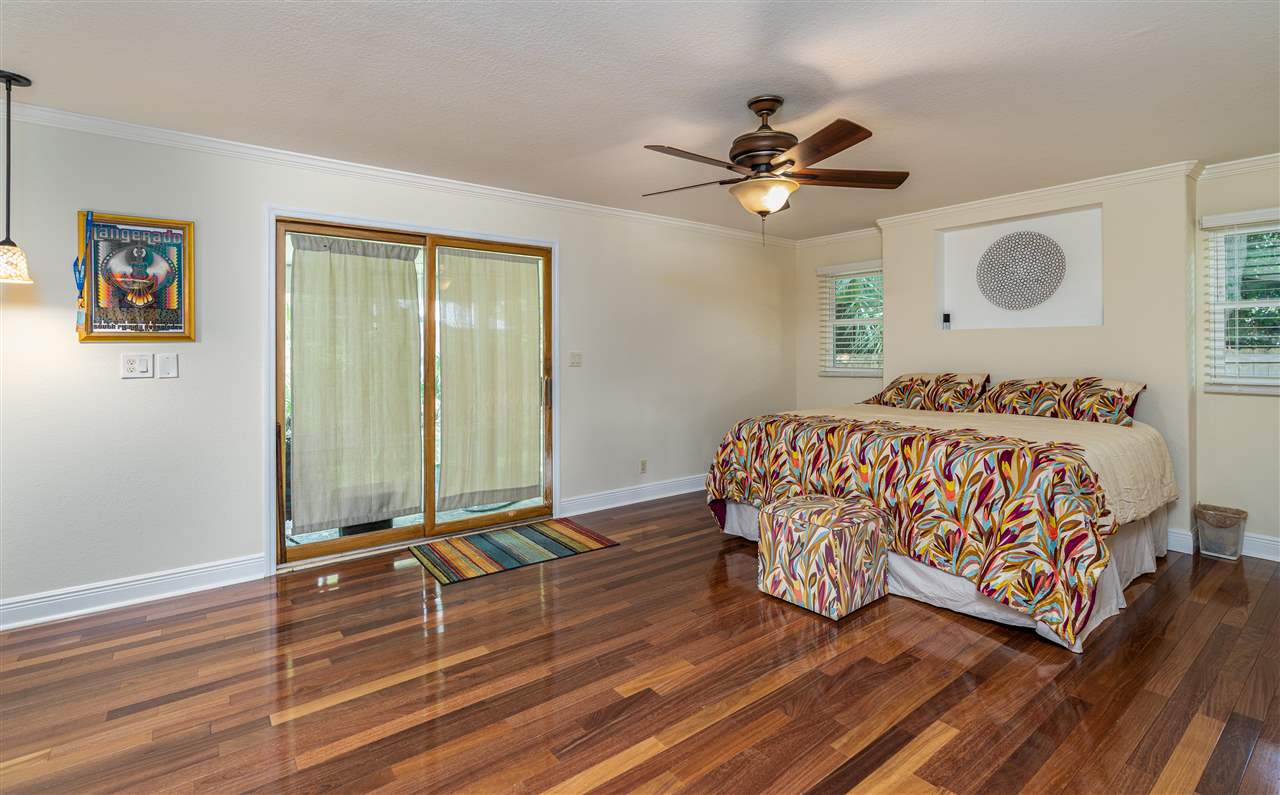 157 Ferrol Road St. Augustine, FL 32084 - Photo 22 of 40 a bedroom with a bed and window