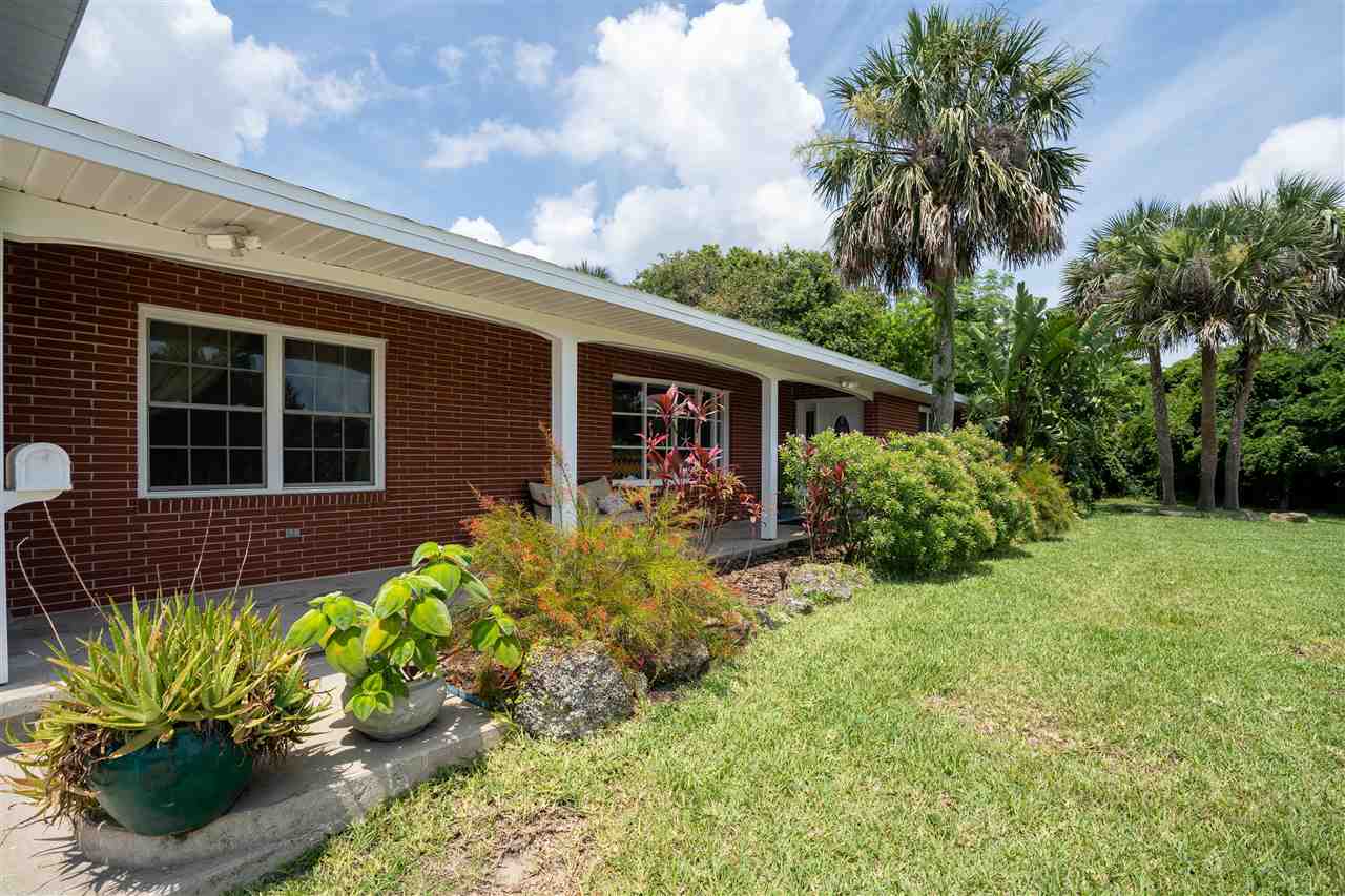 157 Ferrol Road St. Augustine, FL 32084 - Photo 8 of 40 a front view of a house with a yard