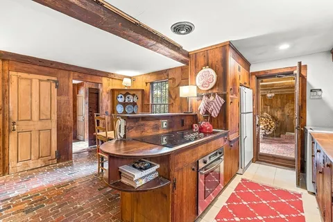 a kitchen with stainless steel appliances granite countertop a stove and a sink