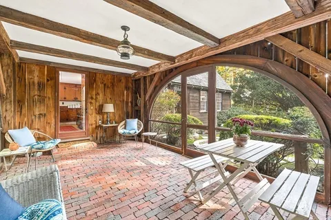 a very nice looking room with large windows