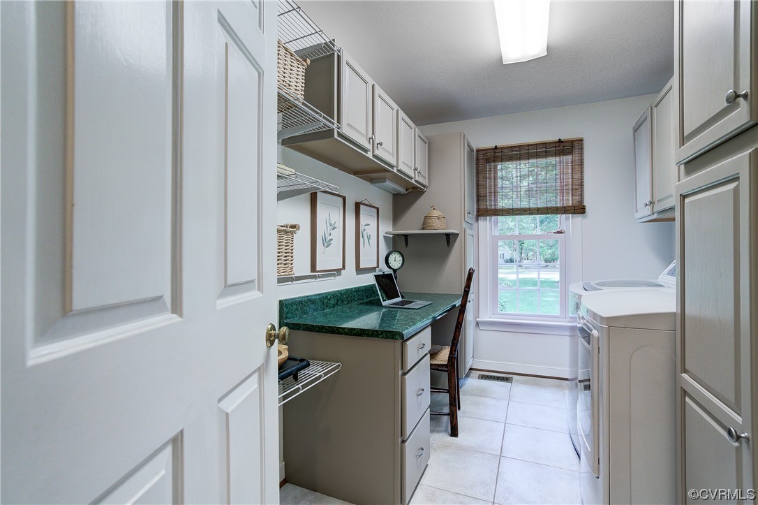 1920 Winterfield Road Midlothian, VA 23113 - Photo 12 of 26 a kitchen with cabinets and a refrigerator
