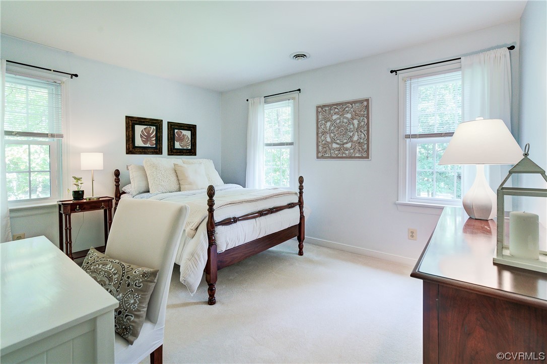 1920 Winterfield Road Midlothian, VA 23113 - Photo 18 of 26 a bedroom with furniture and a window