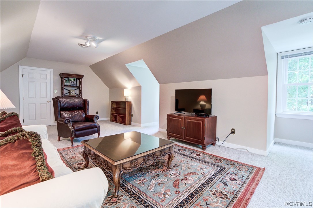 1920 Winterfield Road Midlothian, VA 23113 - Photo 20 of 26 a living room with furniture and a flat screen tv