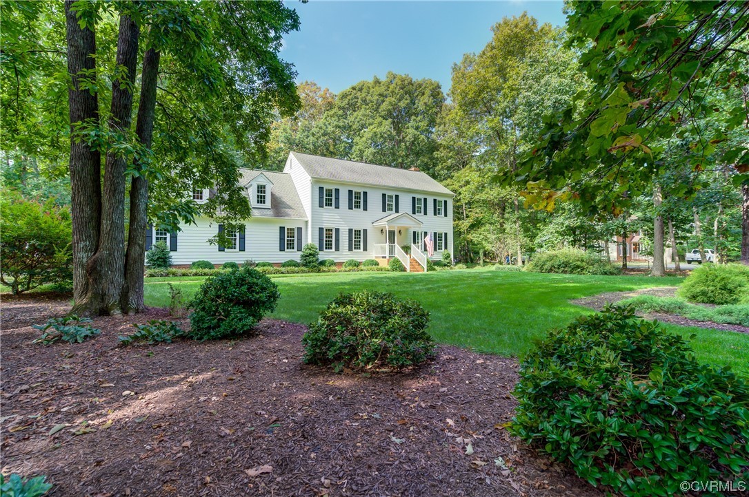 1920 Winterfield Road Midlothian, VA 23113 - Photo 2 of 26 a front view of a house with a yard