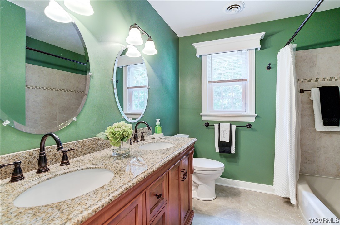 1920 Winterfield Road Midlothian, VA 23113 - Photo 21 of 26 a bathroom with a granite countertop toilet a sink and a mirror