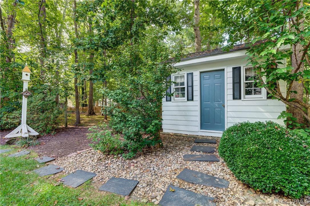 1920 Winterfield Road Midlothian, VA 23113 - Photo 24 of 26 a view of house with backyard and garden