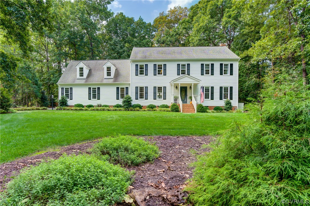 1920 Winterfield Road Midlothian, VA 23113 - Photo 3 of 26 a front view of a house with a yard