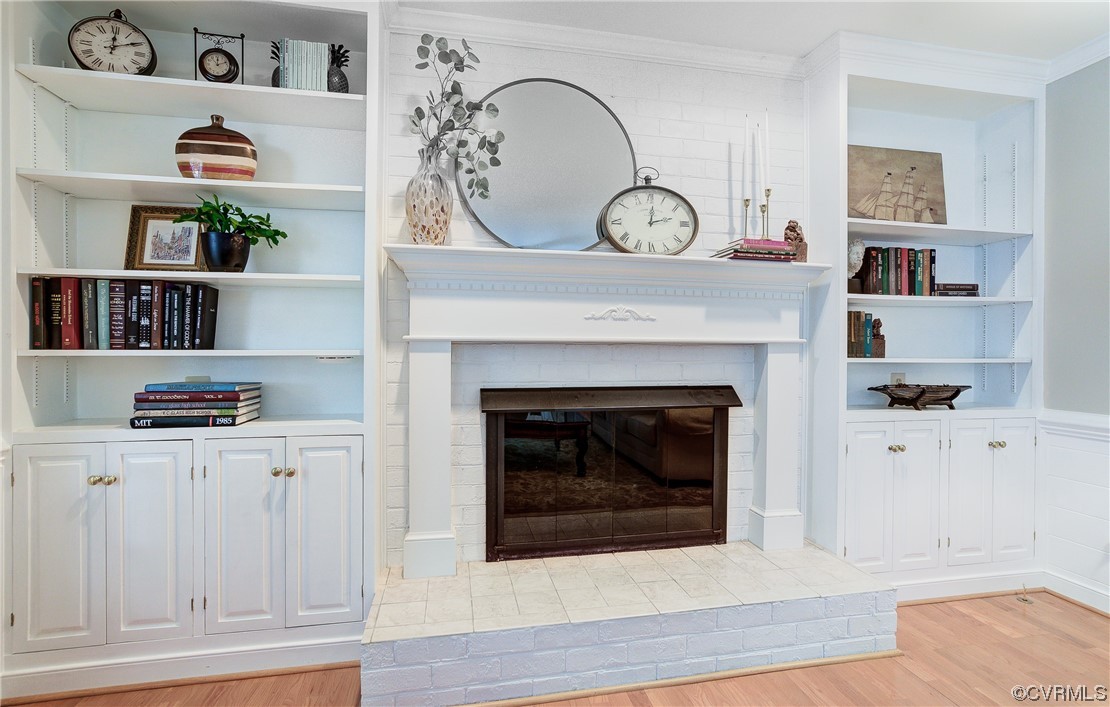 1920 Winterfield Road Midlothian, VA 23113 - Photo 5 of 26 a living room with hard wood floors and a fireplace
