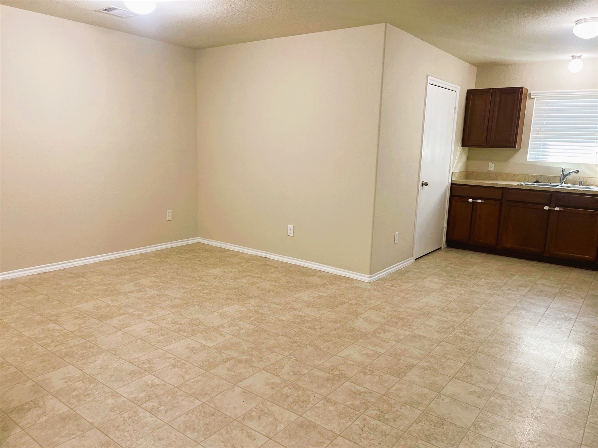 819 Katydid Court Conroe, TX 77301 - Photo 14 of 26 a view of kitchen with a sink