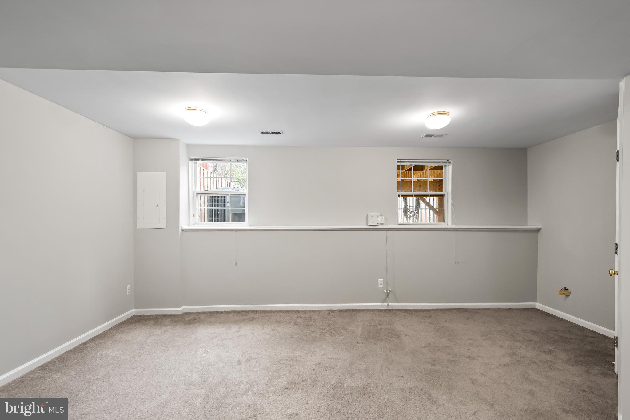 10305 Butternut Circle Manassas, VA 20110 - Photo 26 of 30 a view of an empty room with a window