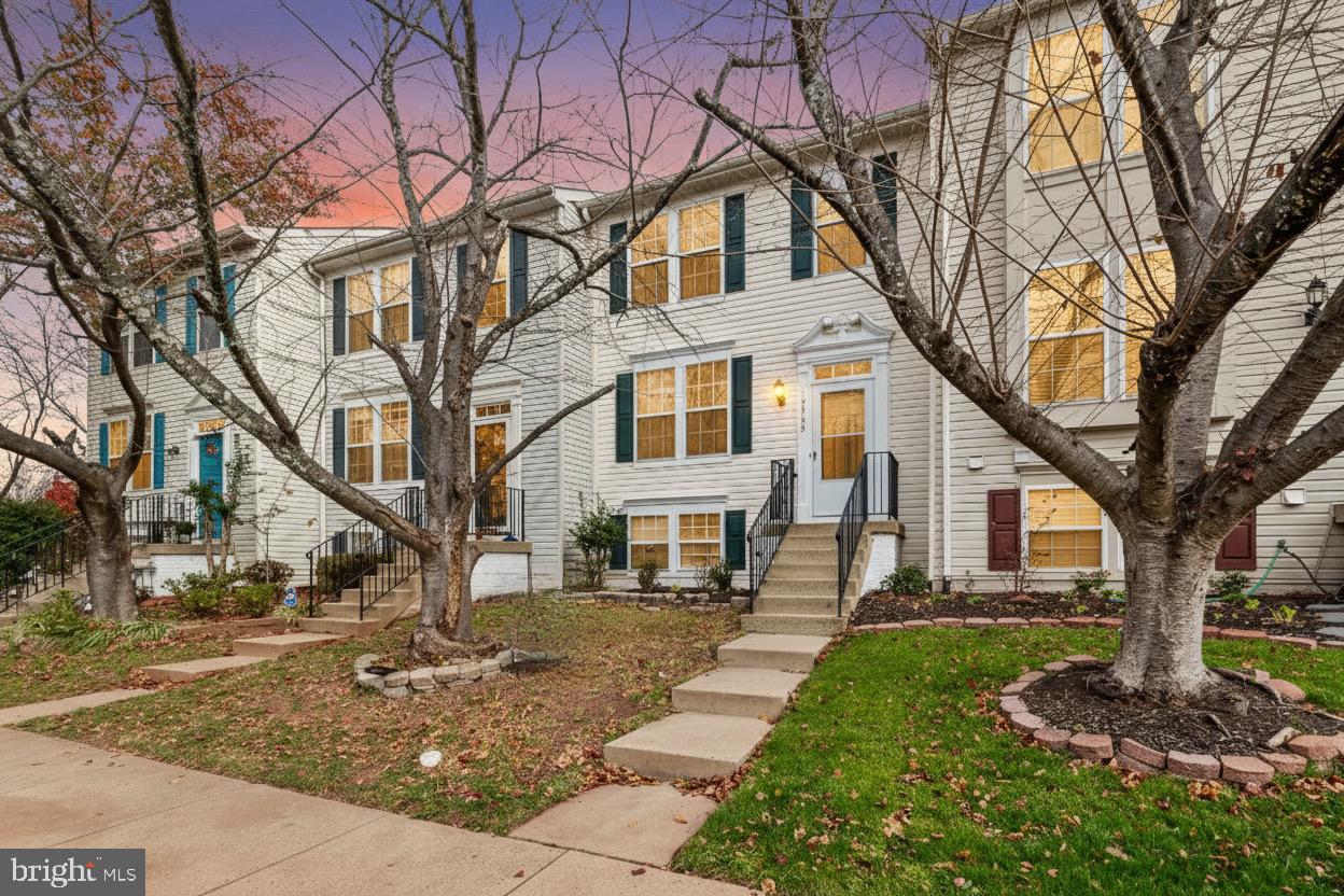 10305 Butternut Circle Manassas, VA 20110 - Photo 29 of 30 a front view of a house with a yard