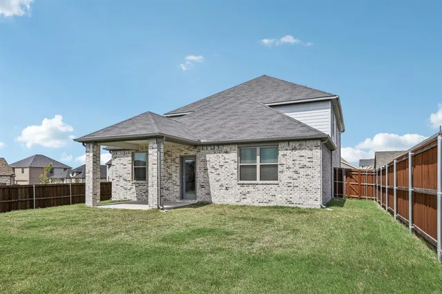 a house view with a garden space
