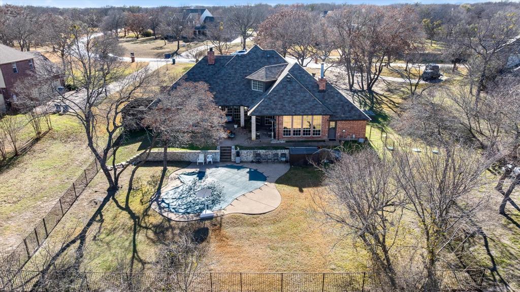1636 Greenview Court Aledo, TX 76008 - Photo 2 of 30 an aerial view of a house with yard and mountain view