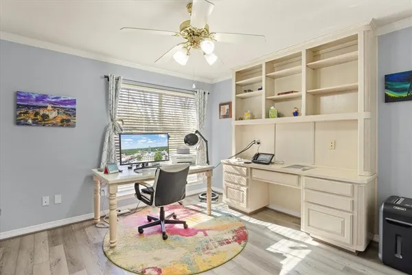 a workspace with furniture and window