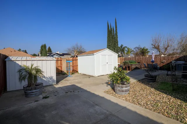 a backyard of a house with lots of green space