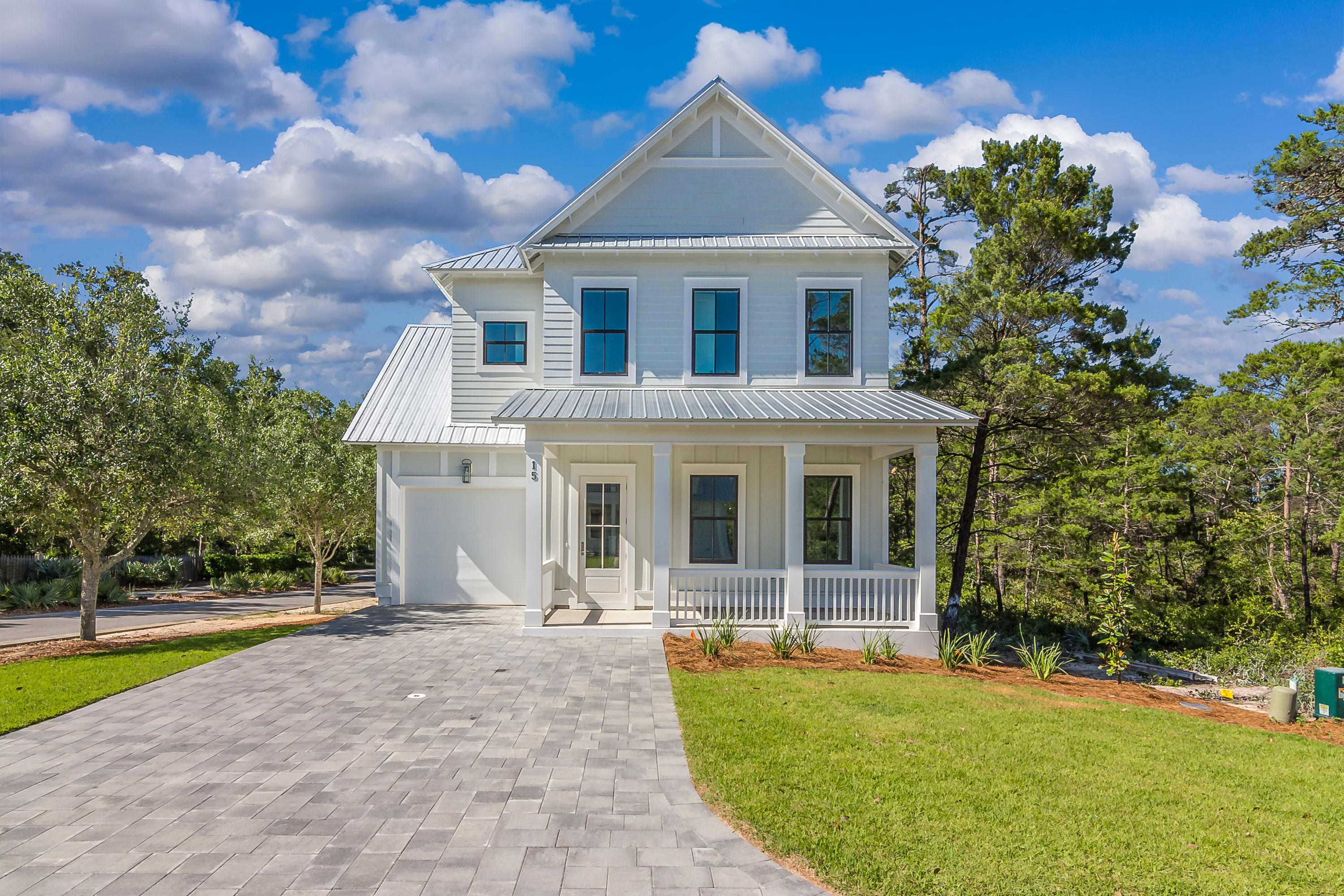 15 Lake Mist Ln Inlet Beach Inlet Beach, FL 32461 - Photo 1 of 48 a front view of a house with a yard