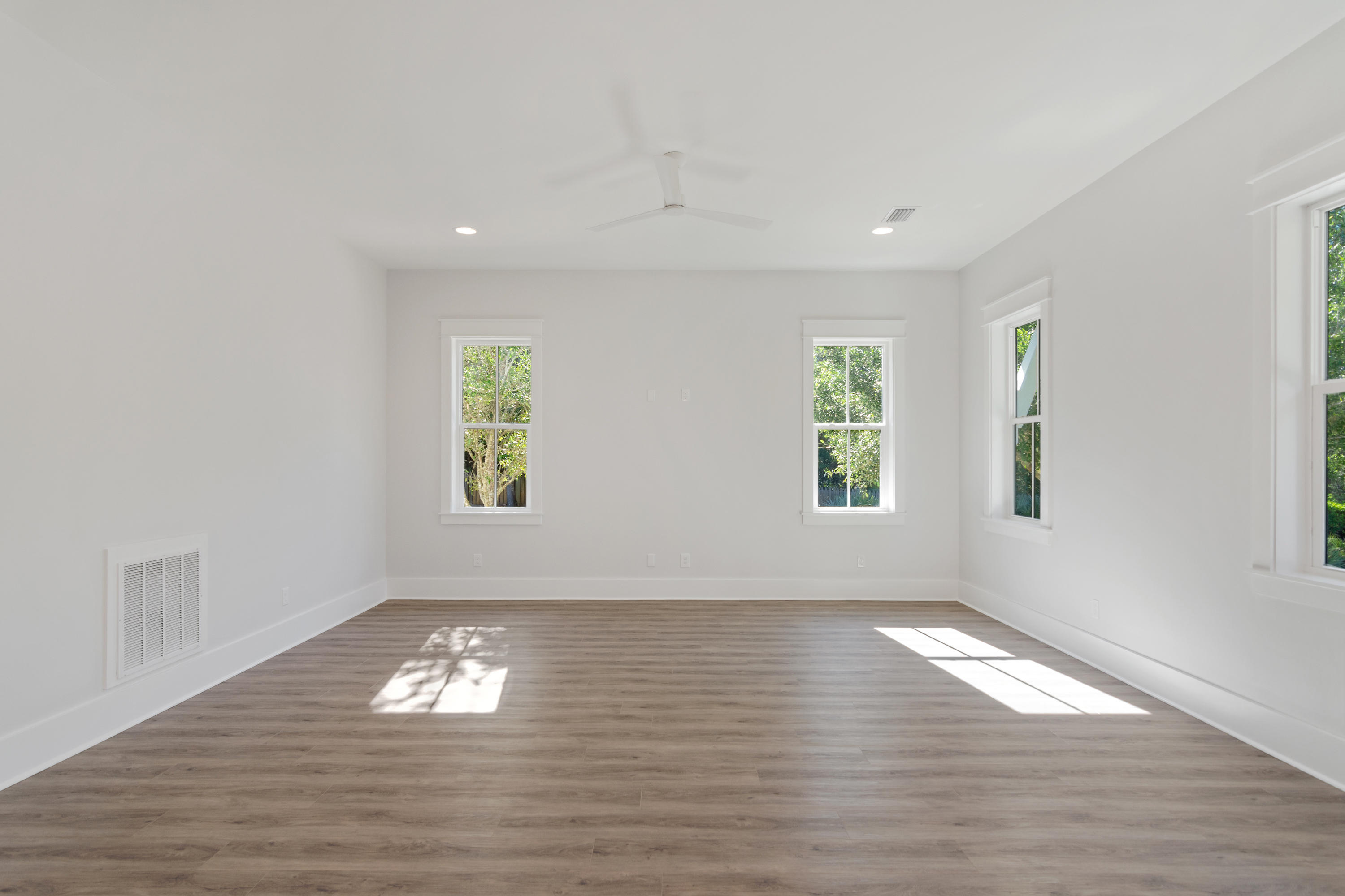 15 Lake Mist Ln Inlet Beach Inlet Beach, FL 32461 - Photo 12 of 48 a view of empty room with wooden floor and window