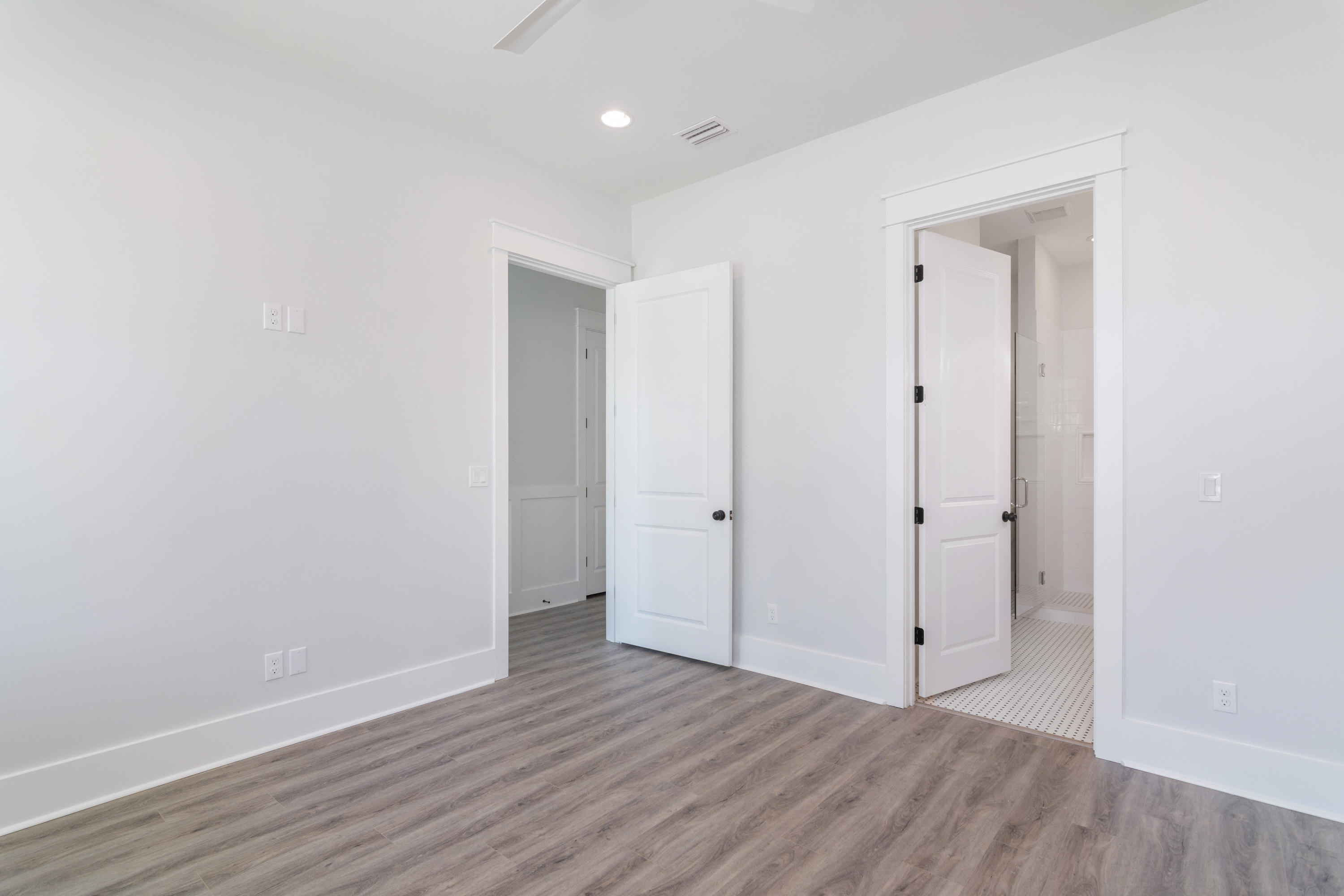 15 Lake Mist Ln Inlet Beach Inlet Beach, FL 32461 - Photo 14 of 48 a view of an empty room with wooden floor