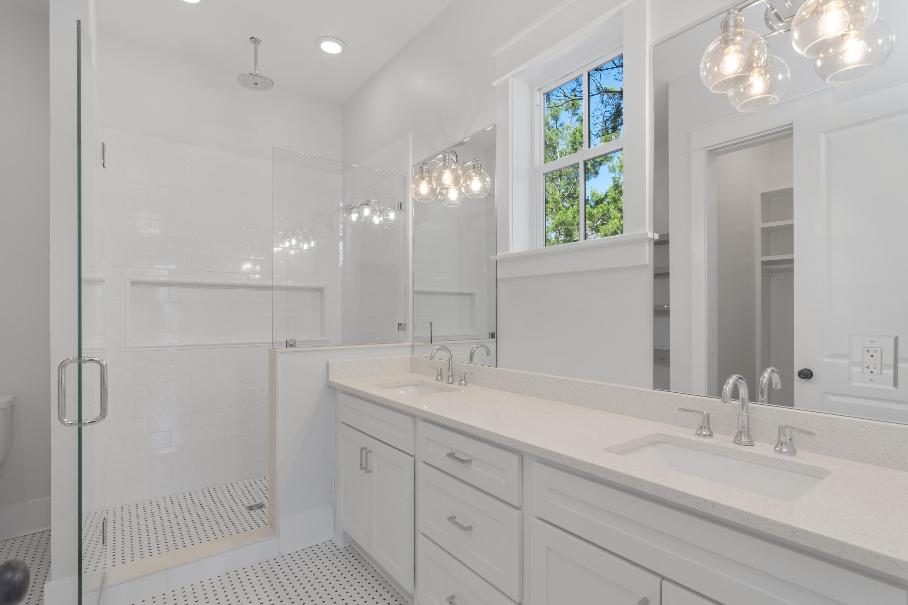 15 Lake Mist Ln Inlet Beach Inlet Beach, FL 32461 - Photo 15 of 48 a bathroom with a double vanity sink and a mirror