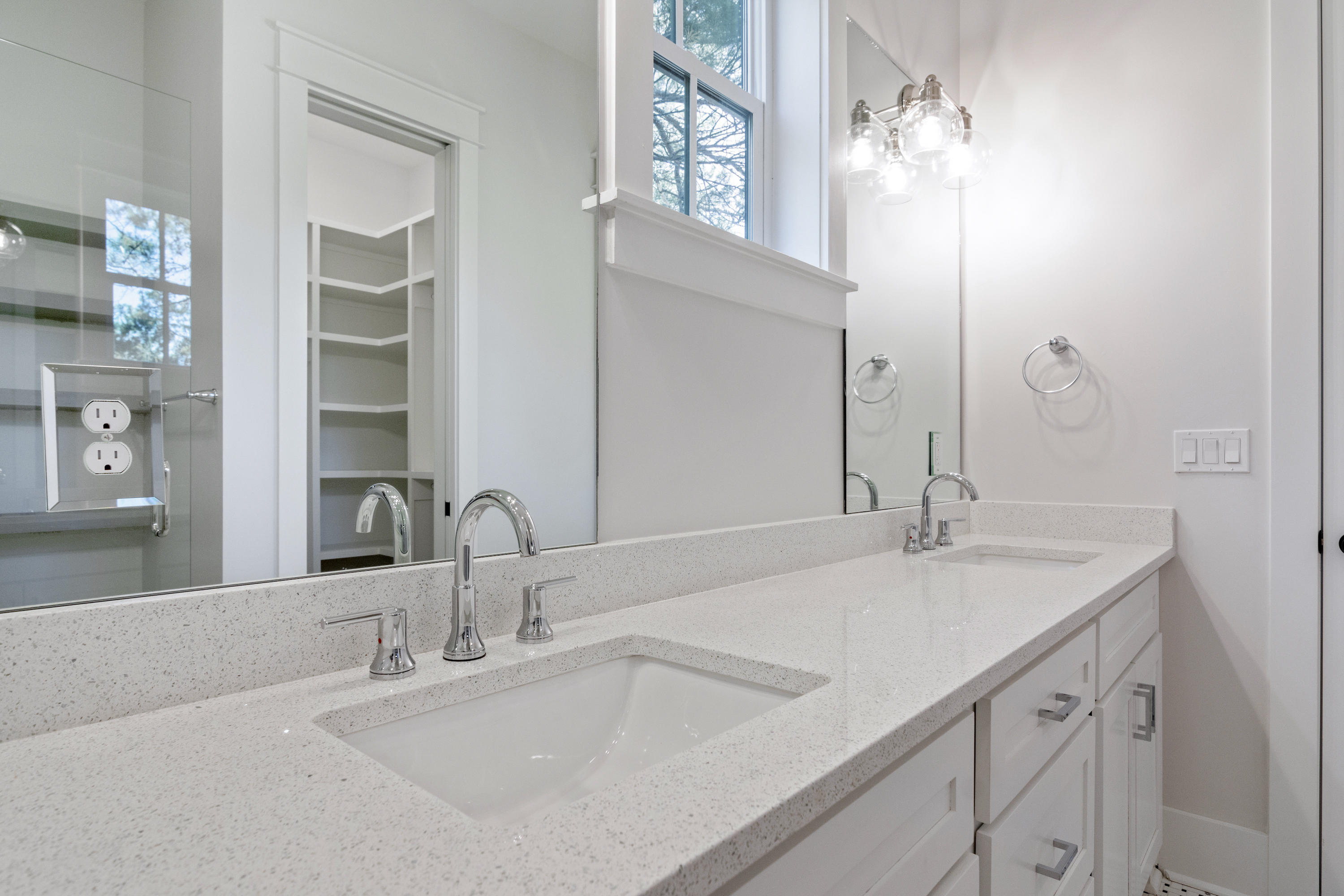 15 Lake Mist Ln Inlet Beach Inlet Beach, FL 32461 - Photo 16 of 48 a bathroom with double sink and a mirror