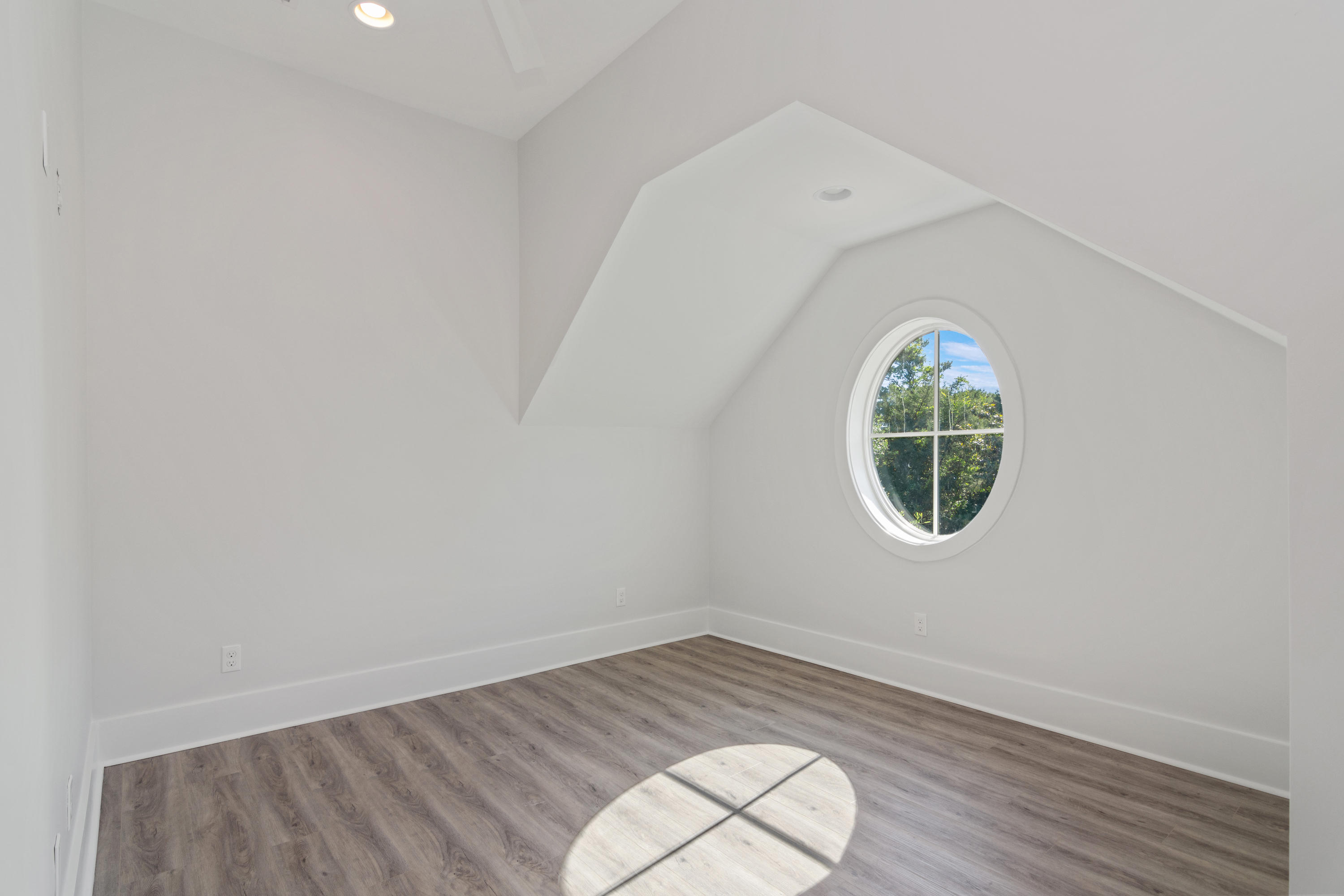15 Lake Mist Ln Inlet Beach Inlet Beach, FL 32461 - Photo 24 of 48 an empty room with wooden floor and windows