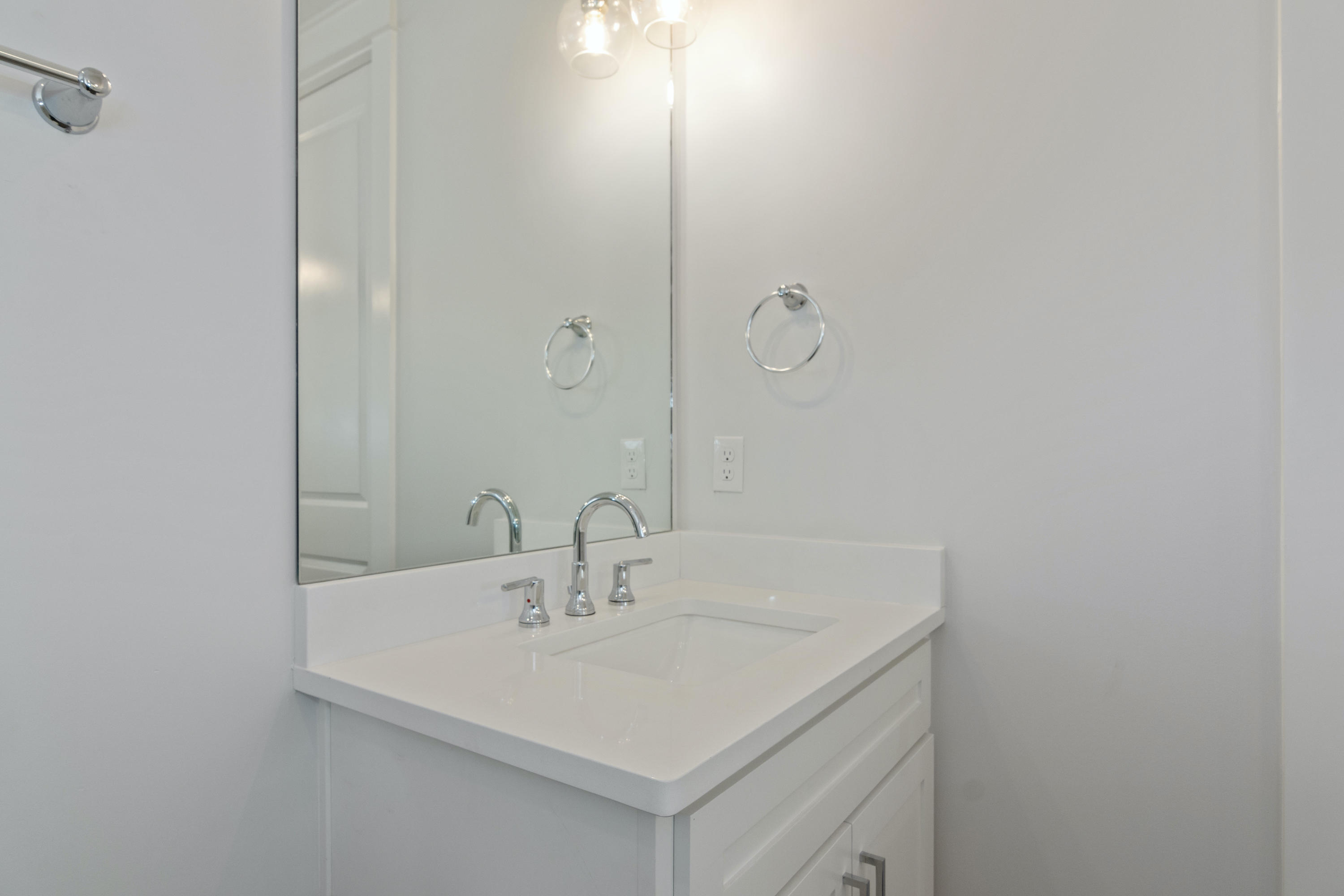 15 Lake Mist Ln Inlet Beach Inlet Beach, FL 32461 - Photo 32 of 48 a bathroom with a sink and mirror