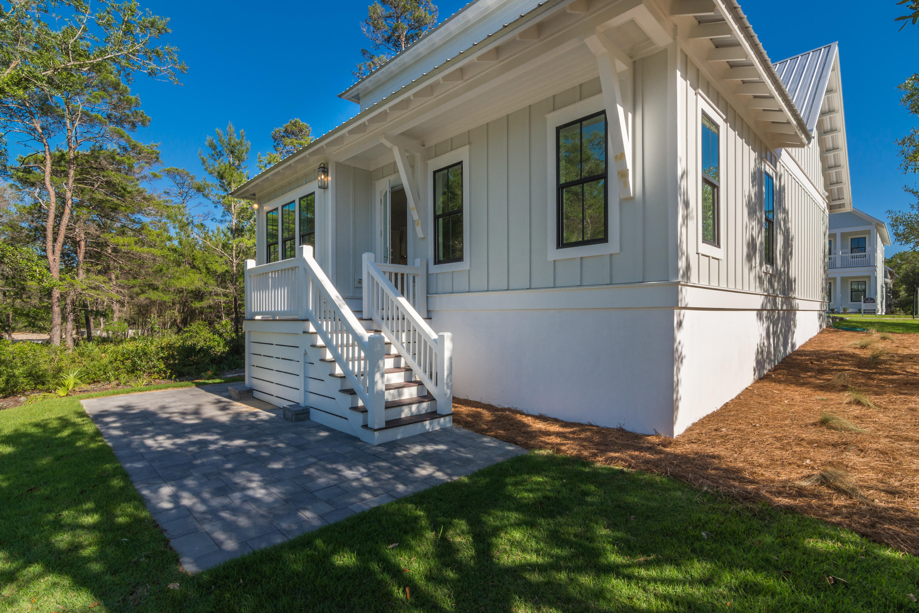 15 Lake Mist Ln Inlet Beach Inlet Beach, FL 32461 - Photo 39 of 48 a view of a house with backyard and porch