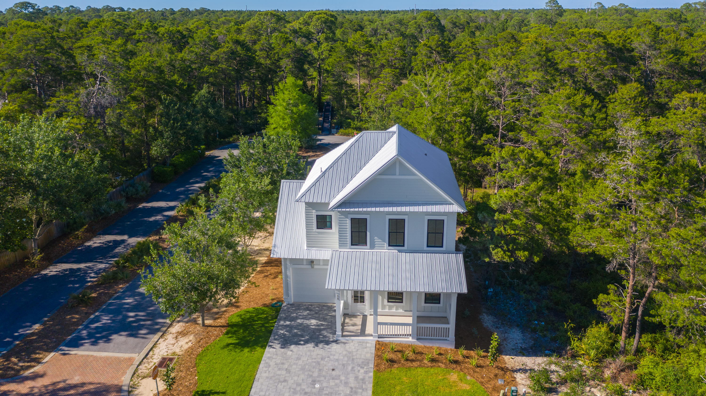 15 Lake Mist Ln Inlet Beach Inlet Beach, FL 32461 - Photo 41 of 48 front view of a house with a yard